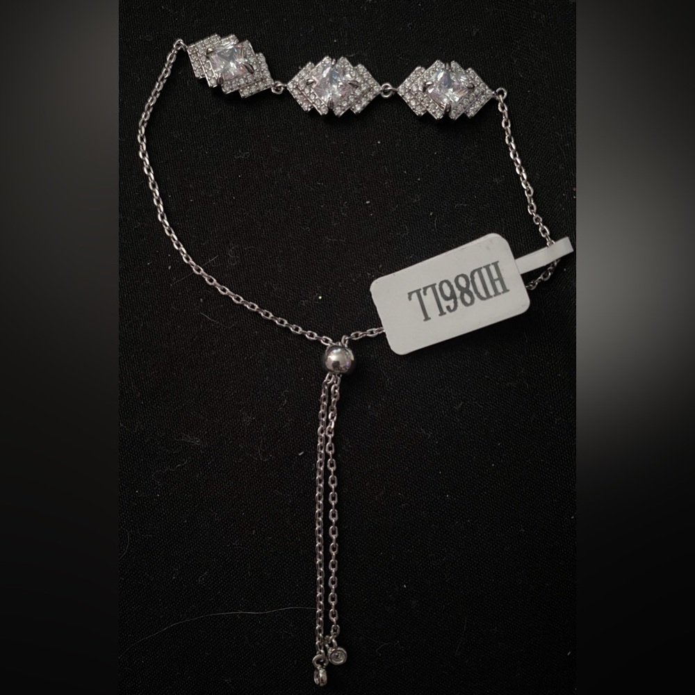 Charmed Aroma silver, and white bracelet